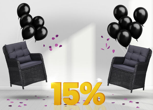 Two black outdoor rattan armchairs with cushions lifted by black balloons and surrounded by purple confetti, with a large yellow 15% sign on a white background.
