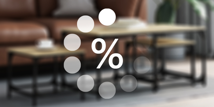 Banner image displaying a blurred interior scene of a living room with a sofa and coffee table. Overlaid are white circles and two large percentage signs, suggesting a promotional offer related to home goods.